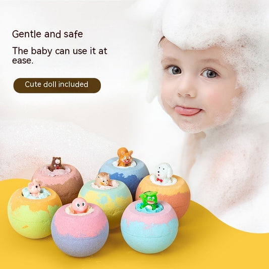 Colorful bath bombs with dolls on a yellow surface, next to a child in a bubble bath.