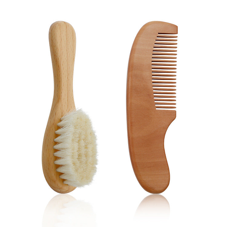 Wooden brush and comb set on a white background
