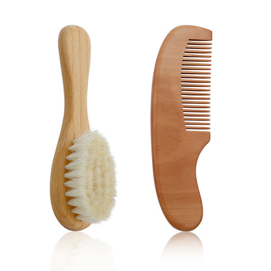Wooden brush and comb set on a white background
