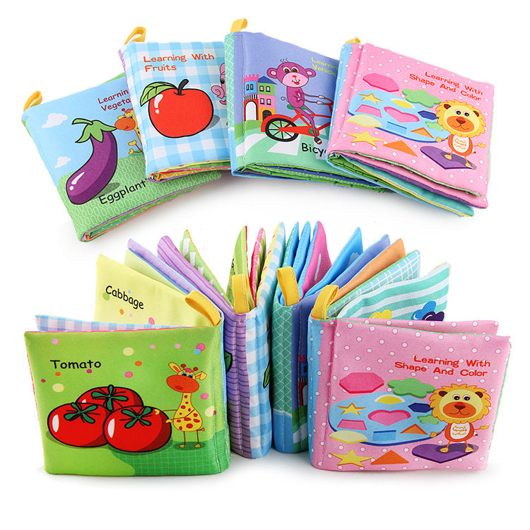 Set of colorful children's soft books on a white background