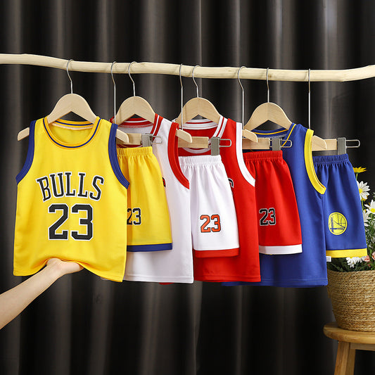 Children's basketball jerseys with number 23 on hangers against a dark curtain background.