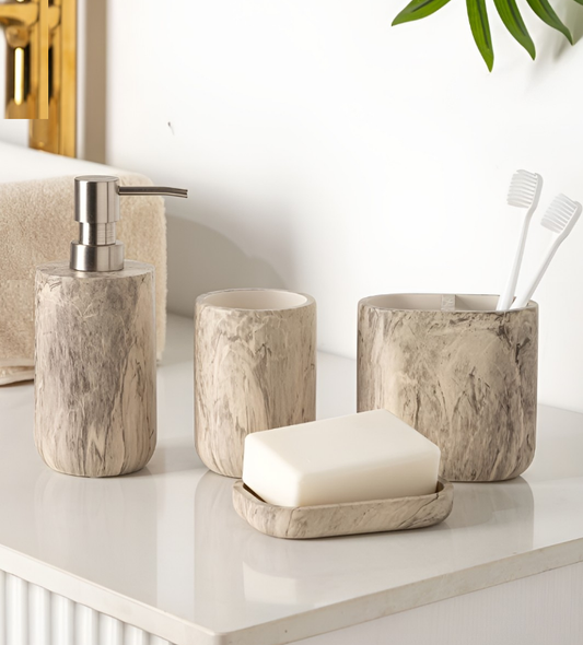 4-piece abstract bath accessories set in brown, includes soap dispenser, toothbrush holder, tumbler and soap dish with modern geometric pattern for contemporary bathroom decor